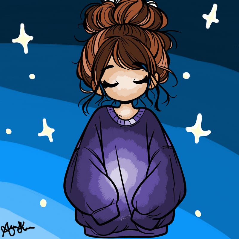 girl with baggy sweatshirt and messy bun