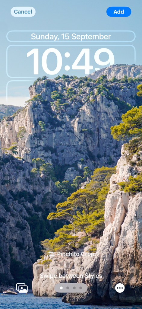 Preview of a high resolution nature landscape wallpaper featuring rocky cliffs and the sea on an iPhone lock screen