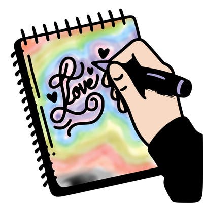 a hand writing “love” in calligraphy on a notebook