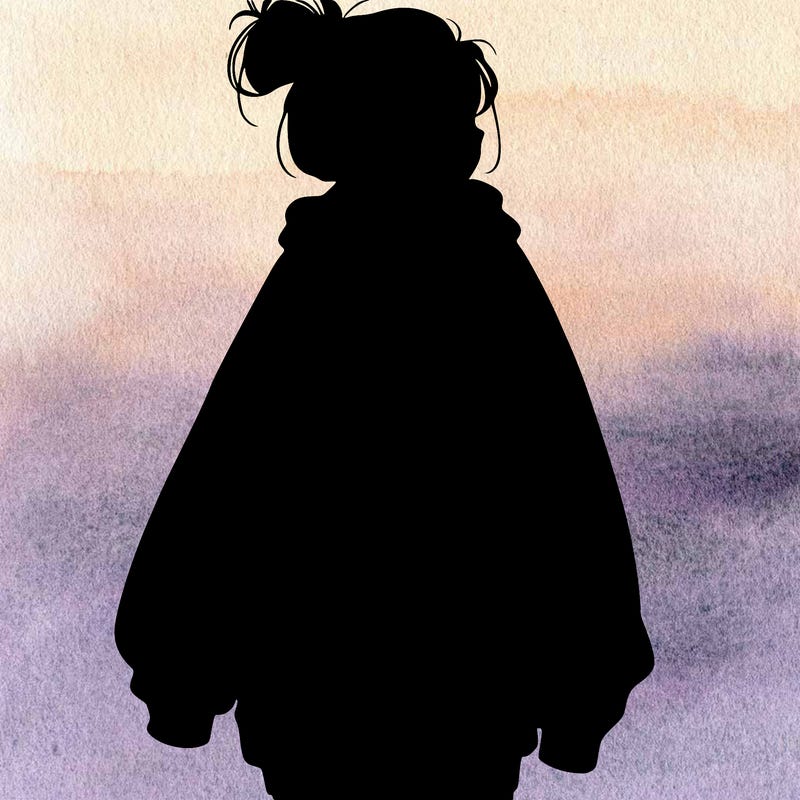 realistic girl with a oversized sweatshirt on and a bun