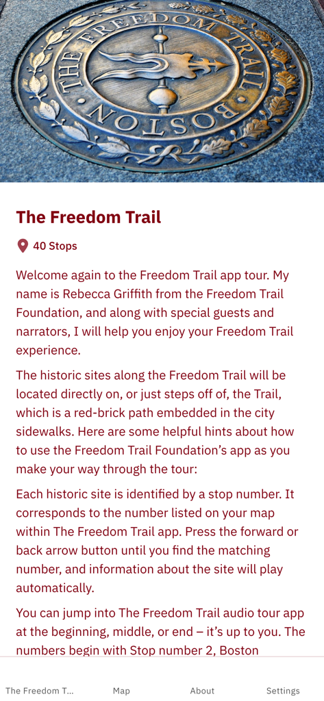 Official Freedom Trail® App - Introduction screen of the Official Freedom Trail app featuring a bronze Boston medallion and tour welcome text.
