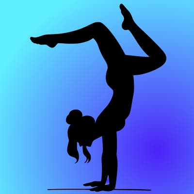 a woman doing a handstand