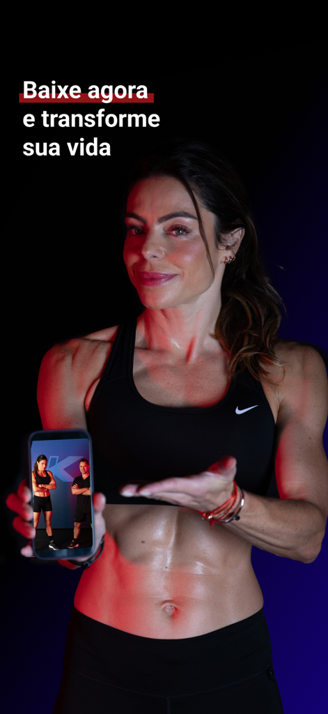 Kikos Fit - A fit woman in sports gear holding a phone displaying the Kikos Fit app with trainers