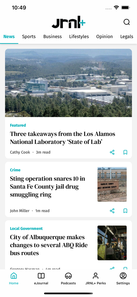 Albuquerque Journal Newspaper - Mobile screen of the Albuquerque Journal app showing local news articles about Los Alamos and Santa Fe