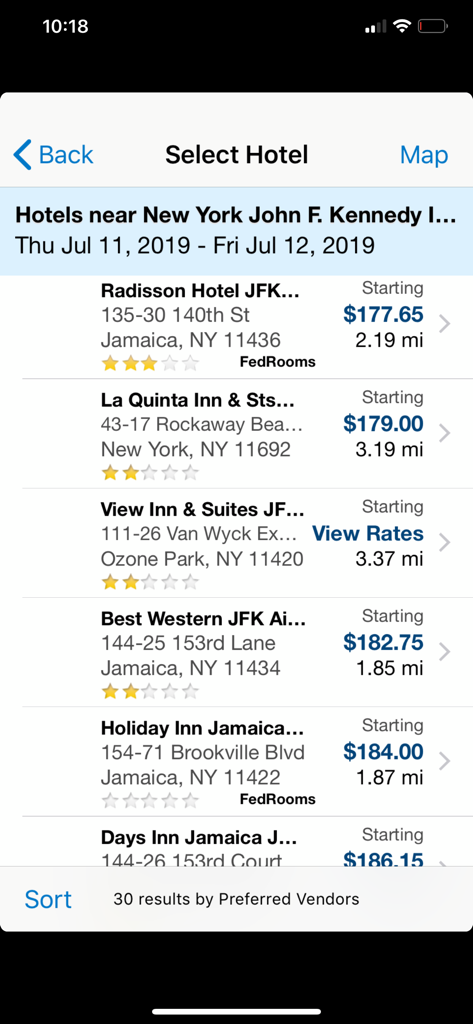 ConcurGov mobile app interface showing a list of hotels near JFK airport with FedRooms government rates