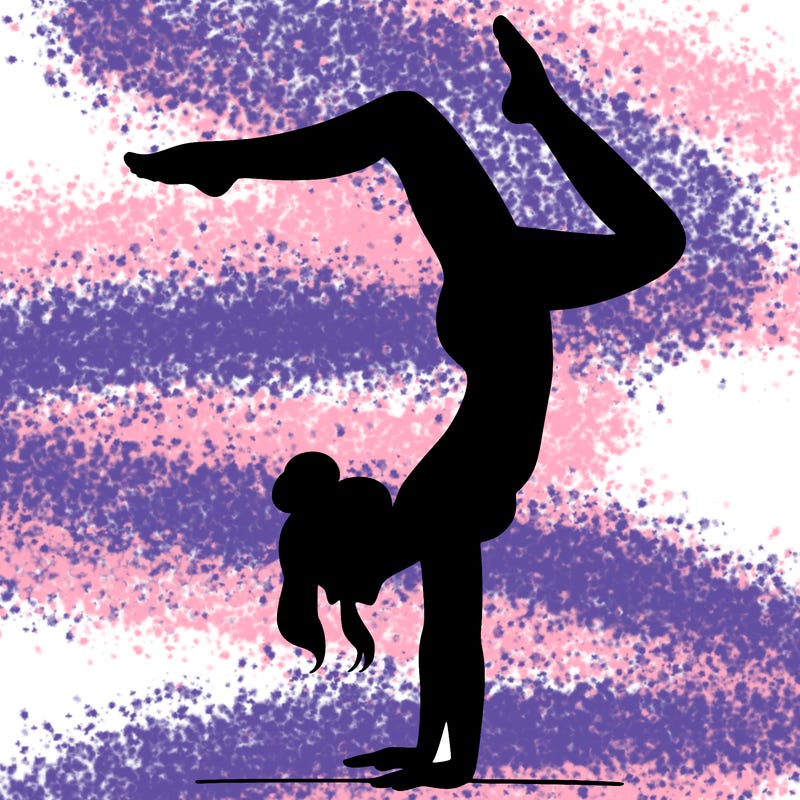 a woman doing a handstand