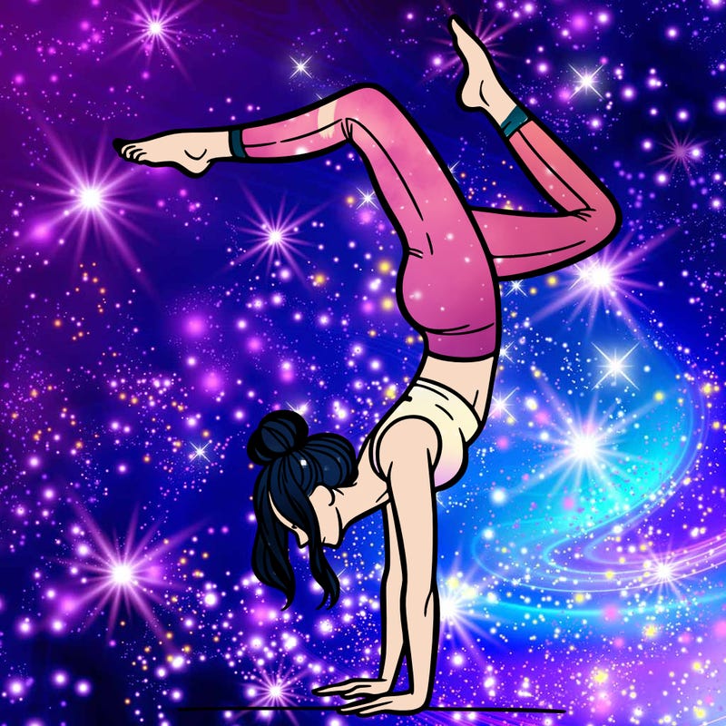 a woman doing a handstand