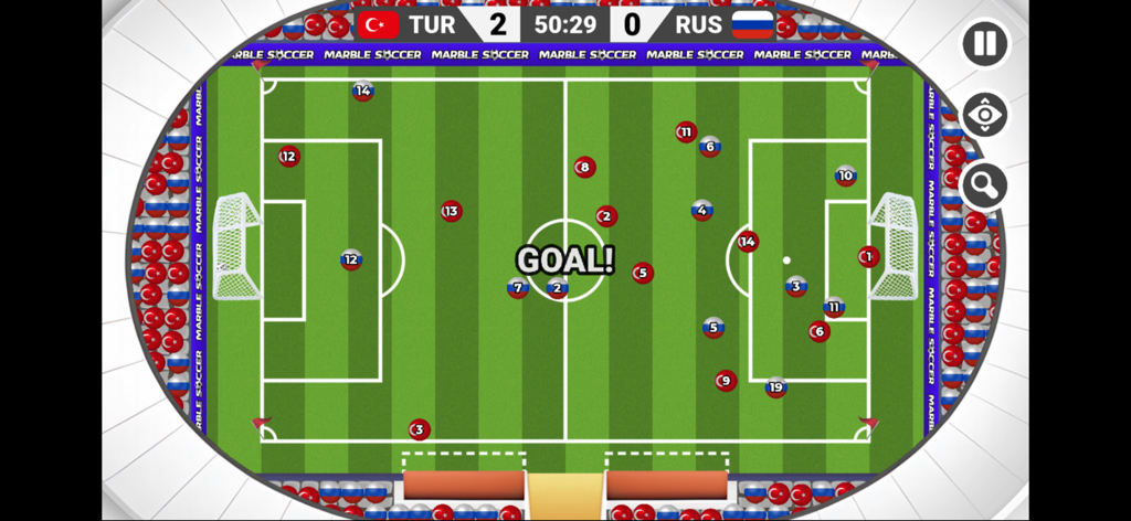 Marble Soccer - Top down view of a marble soccer game in a stadium showing a goal being scored between Turkey and Russia