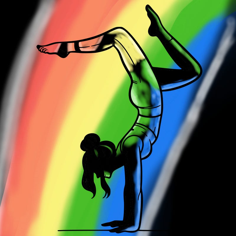 a woman doing a handstand