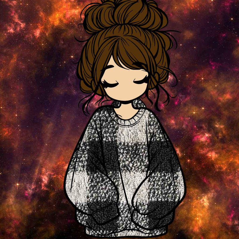 girl with baggy sweatshirt and messy bun