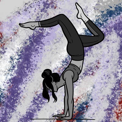 a woman doing a handstand