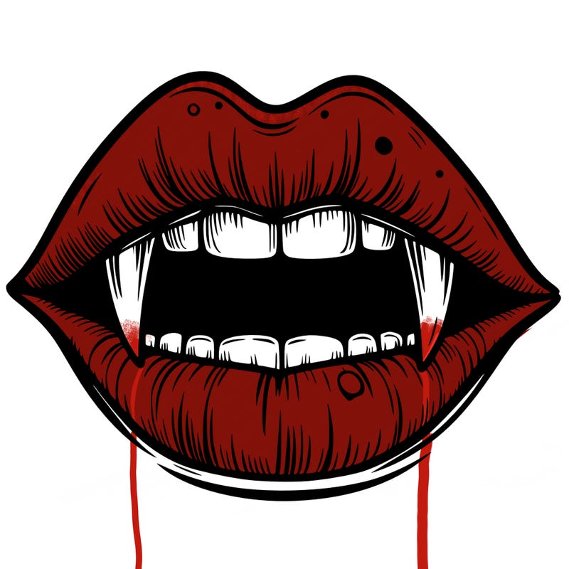 lips with vampire teeth