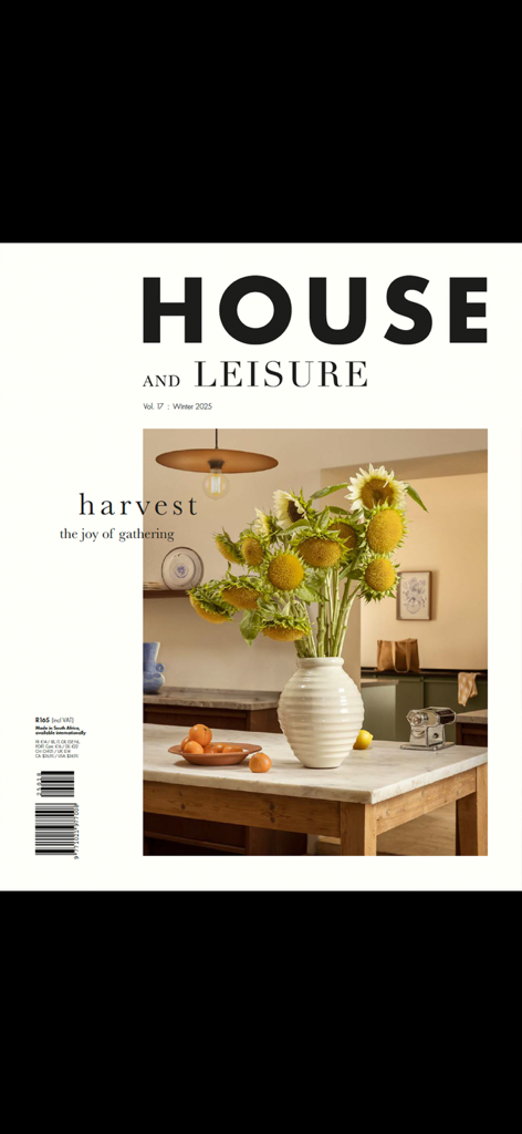 House & Leisure - House and Leisure magazine cover featuring sunflowers in a white vase on a marble table