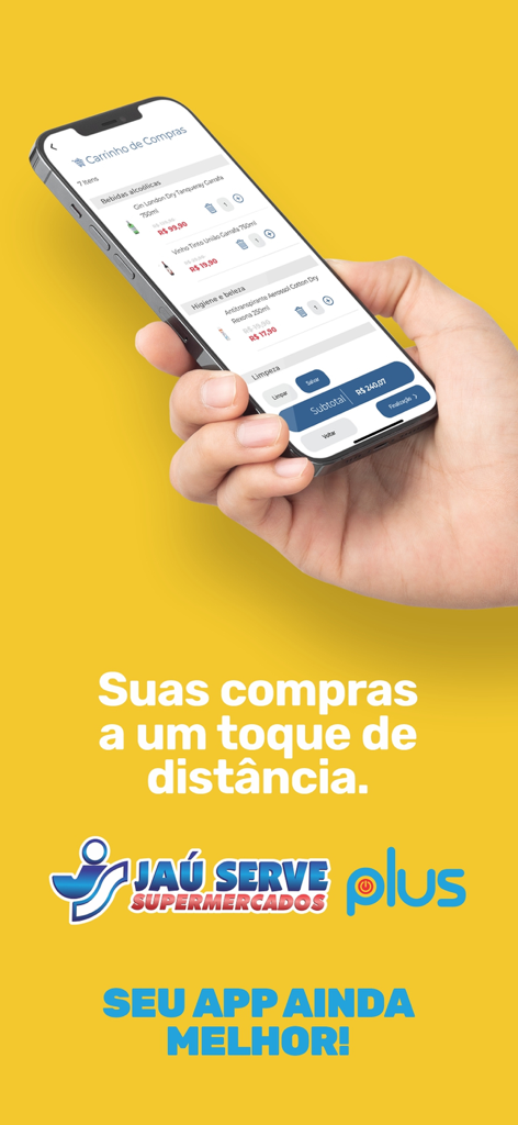 Hand holding a smartphone showing the shopping cart screen of the Jau Serve Plus Delivery app