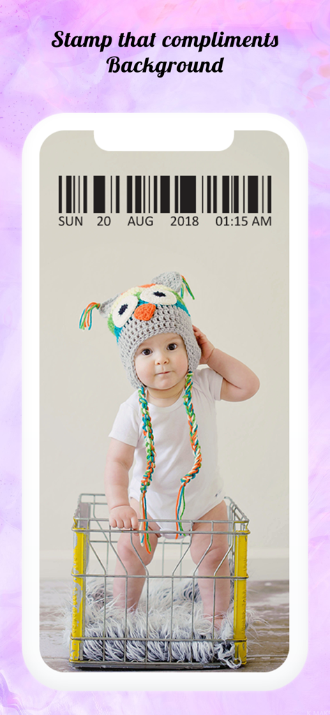 A photo of a baby in an owl hat with a decorative barcode date and time stamp overlay