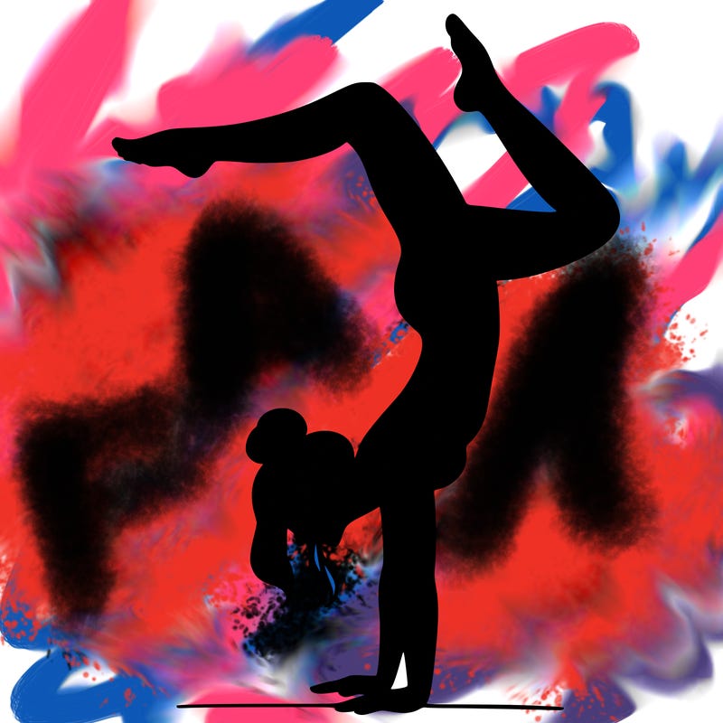 a woman doing a handstand