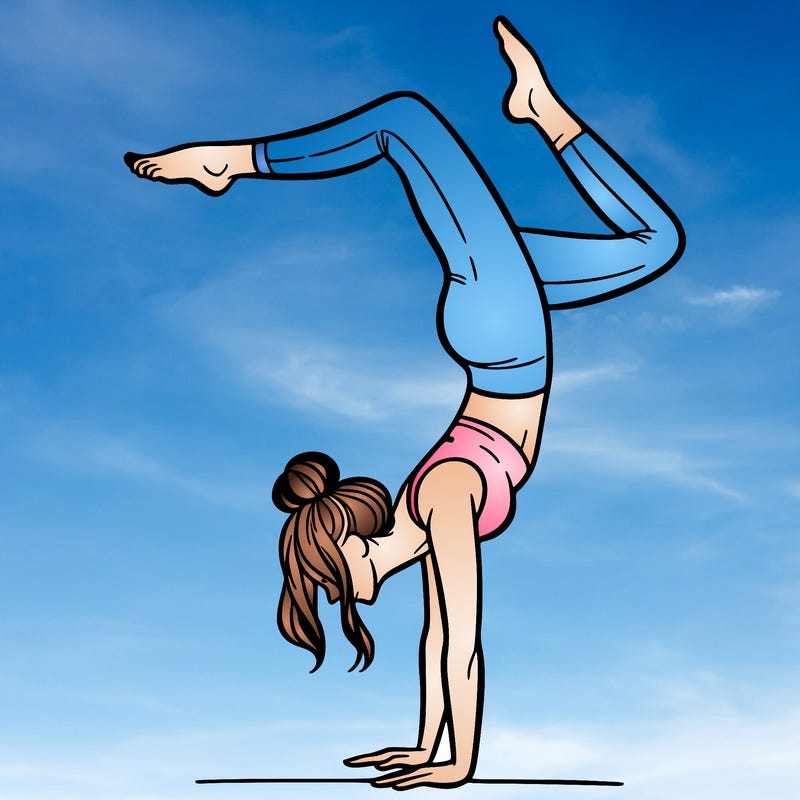 a woman doing a handstand