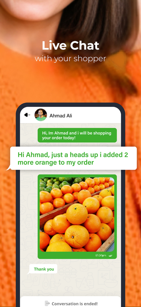 Uma captura de tela do aplicativo Basket mostrando uma conversa de chat ao vivo entre um cliente e seu personal shopper com uma foto de laranjas frescas.