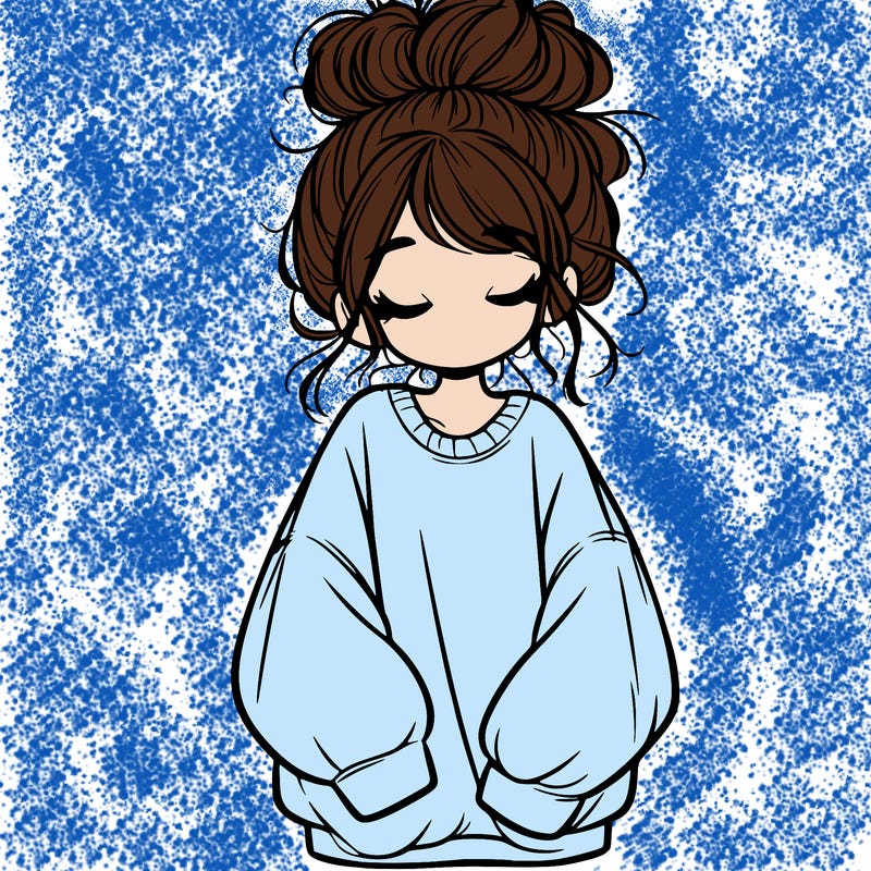 girl with baggy sweatshirt and messy bun
