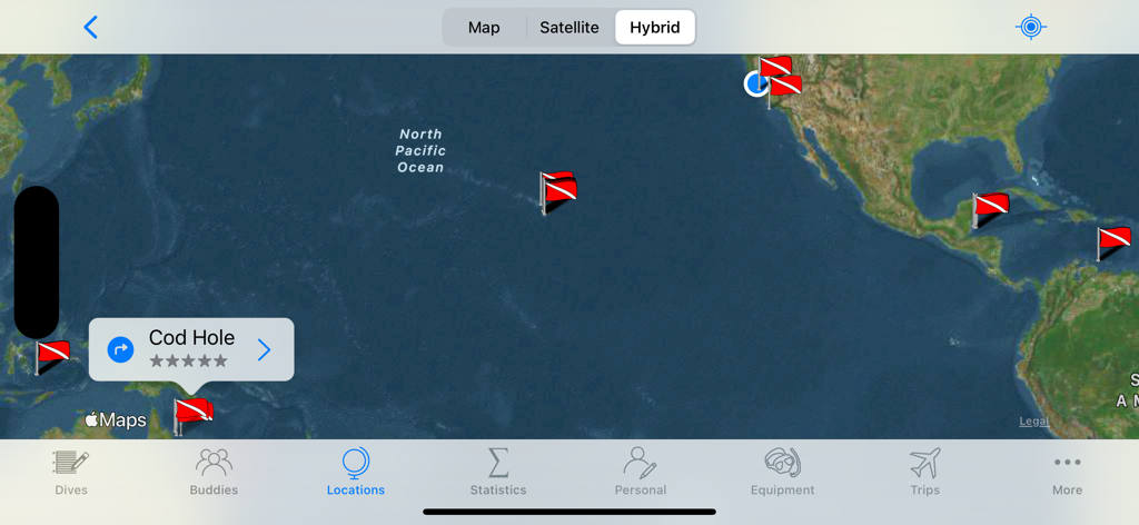 Dive Log - World map in the Dive Log app showing various scuba diving locations marked with red and white flags