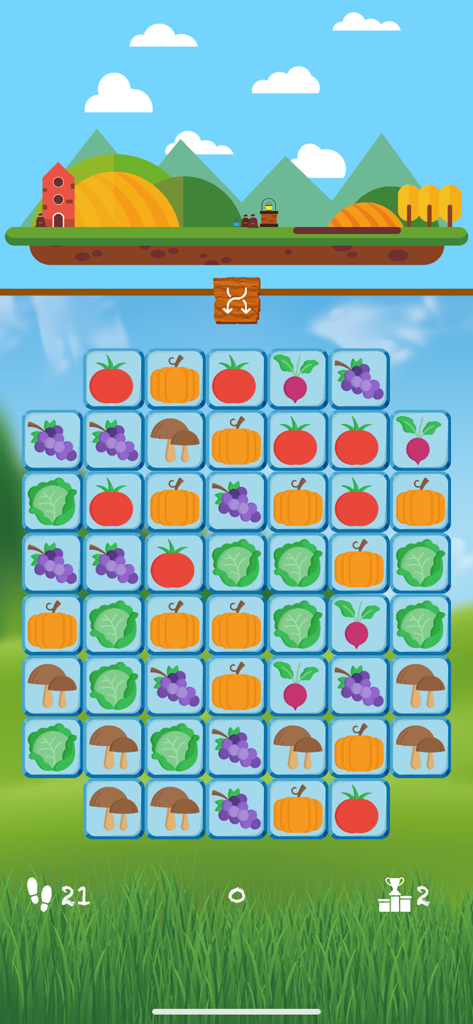 Mama's Farm: Tile Match Game - A colorful tile match puzzle board featuring farm vegetables like tomatoes and pumpkins with a scenic rural background.
