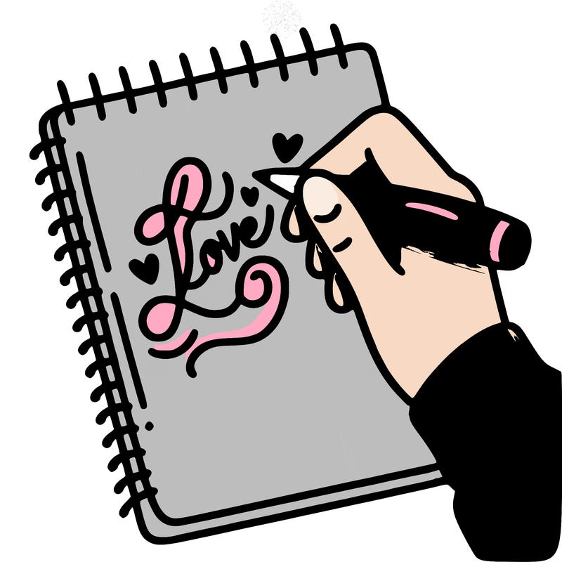 a hand writing “love” in calligraphy on a notebook