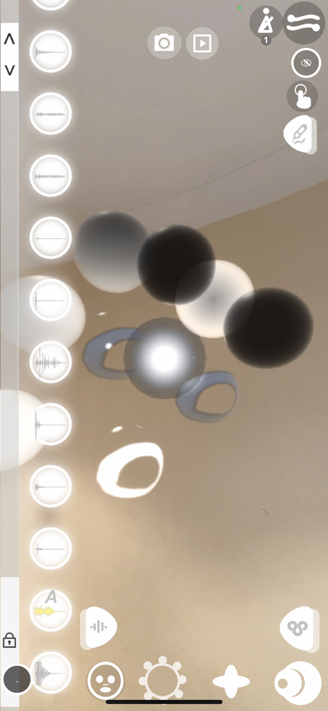 The BOCLAA app interface showing an augmented reality environment with floating sound nodes for music production.