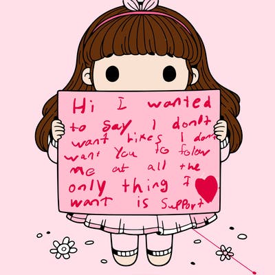 a girl holding a blank pices paper