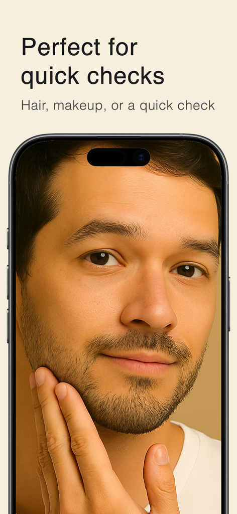 Mirror ツ - Un uomo che controlla i capelli e la barba nell'app Mirror sul suo smartphone