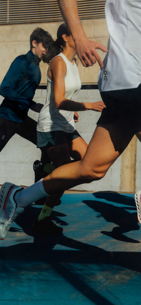 On: Shop Shoes & Apparel - A group of people running in On brand performance shoes and athletic apparel