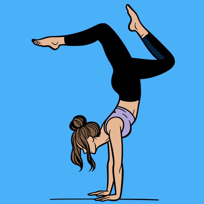 a woman doing a handstand