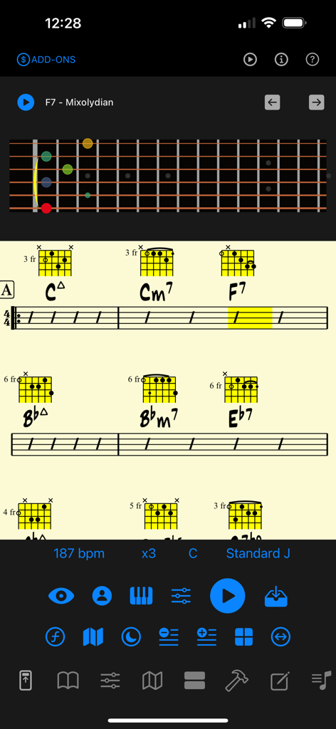 Mapping Tonal Harmony Pro - Pantalla de la aplicación Mapping Tonal Harmony Pro con un diapasón de guitarra y progresiones de acordes de jazz.