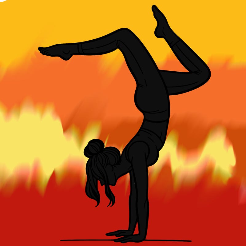 a woman doing a handstand