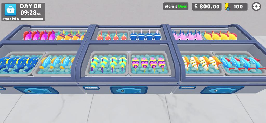 Dreamy Town - Una colorida exhibición de varios peces de dibujos animados en una tienda dentro del juego Dreamy Town