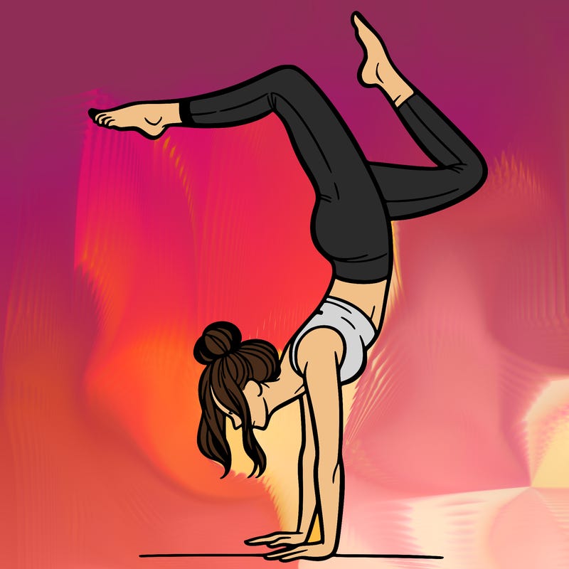 a woman doing a handstand