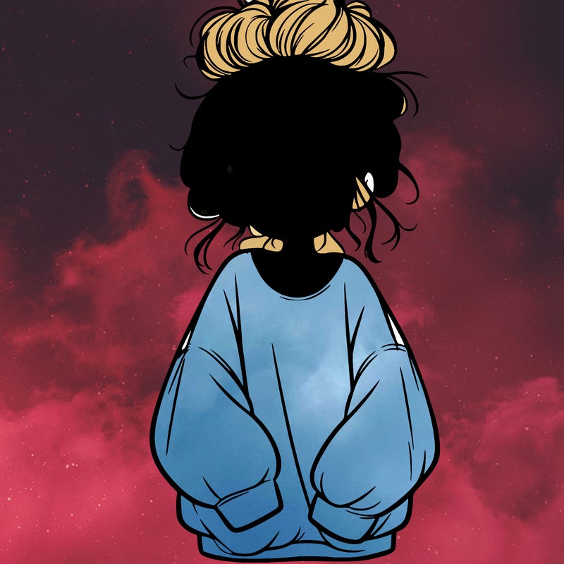 girl with baggy sweatshirt and messy bun