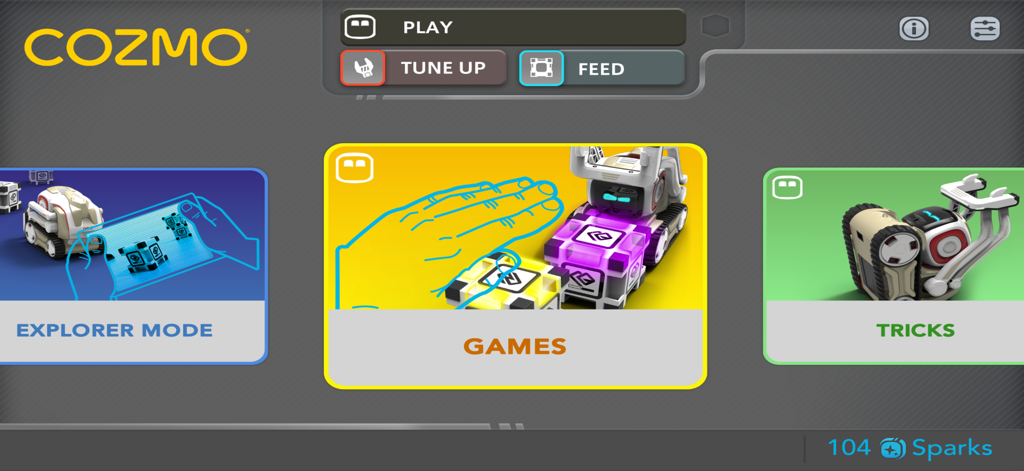 Cozmo Robot - The main menu interface of the Cozmo Robot app showing Explorer Mode Games and Tricks