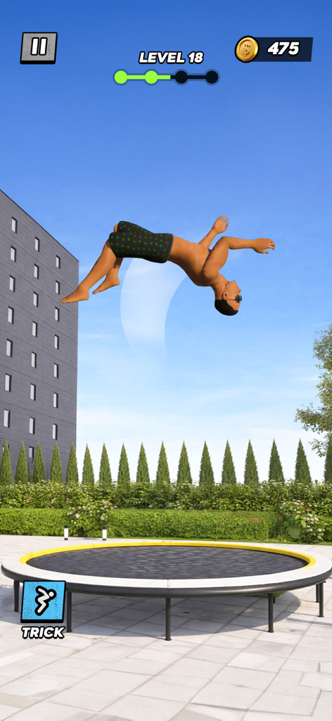 Backflip Mania - A character performing a backflip over a trampoline in Backflip Mania