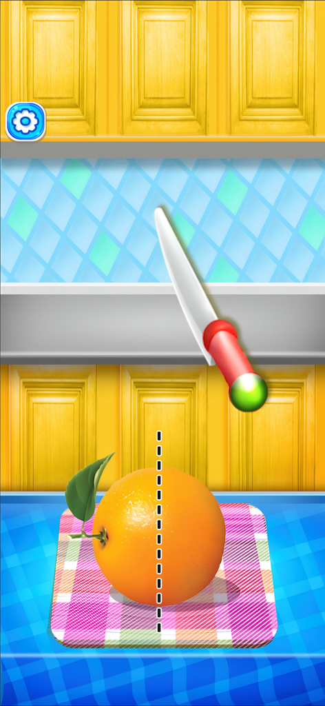 Cortando una naranja con un cuchillo virtual en un juego de simulación de cocina para niños.