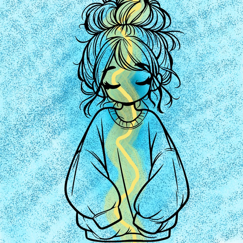 girl with baggy sweatshirt and messy bun