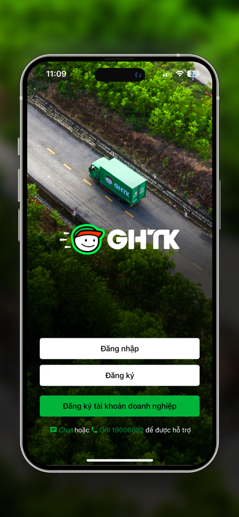 GHTK - Pantalla de inicio de sesión de la aplicación GHTK con un camión de reparto verde y opciones para iniciar sesión o registrar una cuenta de empresa
