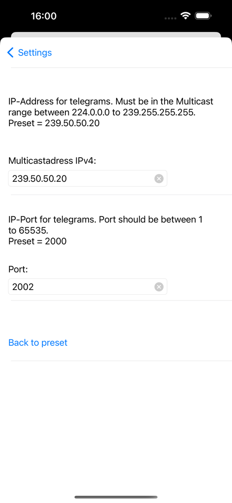 Network settings screen in the Fastclock app for configuring multicast IP and port.