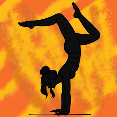 a woman doing a handstand