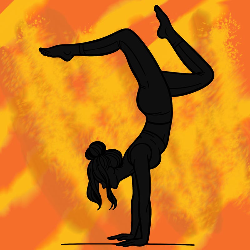 a woman doing a handstand