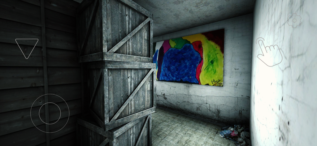 First-person view of stacked wooden crates and a colorful painting in a haunted mansion room.