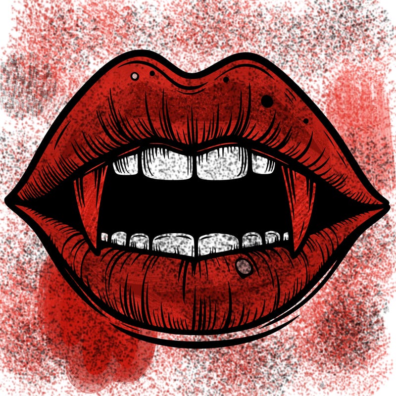 lips with vampire teeth