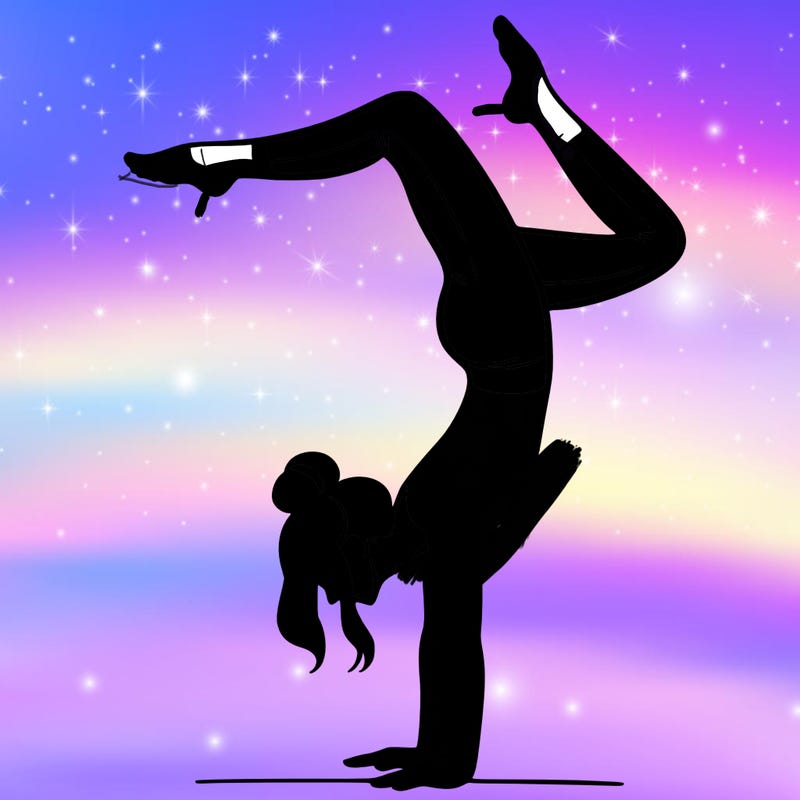 a woman doing a handstand