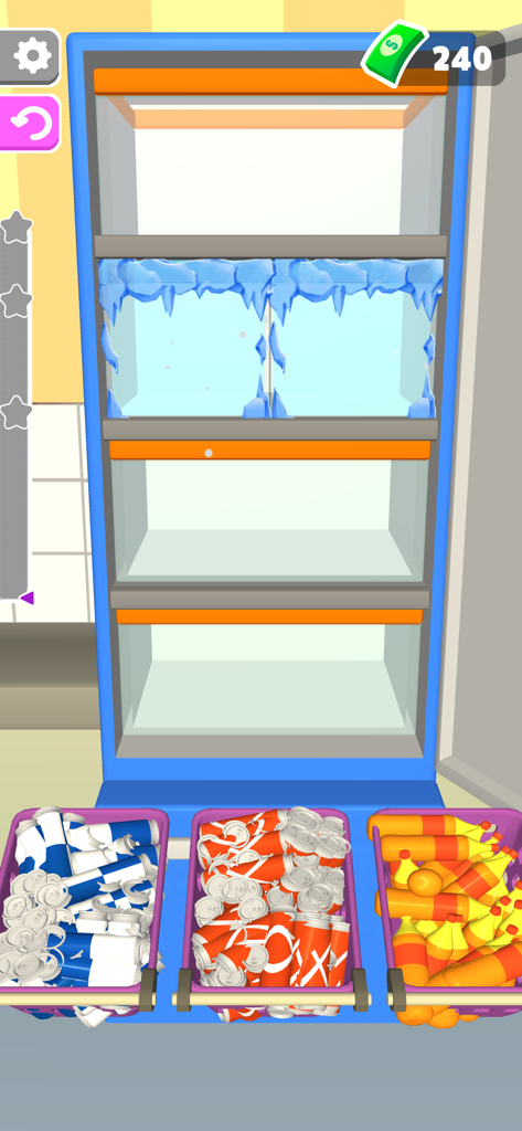 A screen from the Fill The Fridge mobile game showing an empty blue refrigerator and three baskets of beverage cans and bottles ready to be organized.
