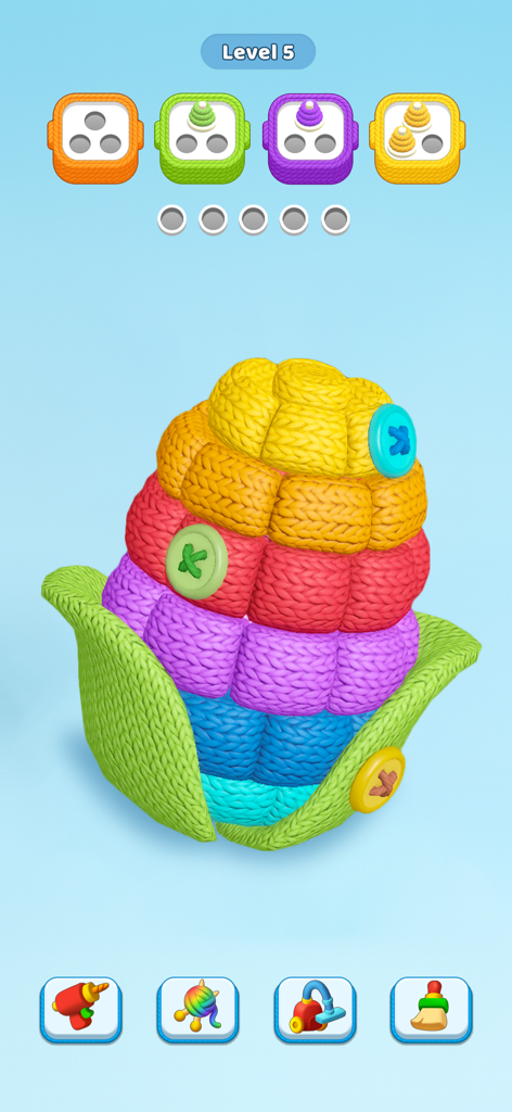A colorful knitted corn cob puzzle in the Knit Away sorting game