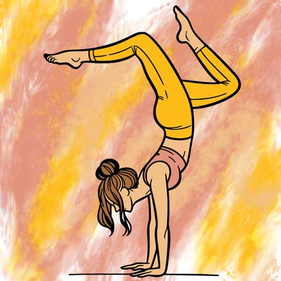 a woman doing a handstand
